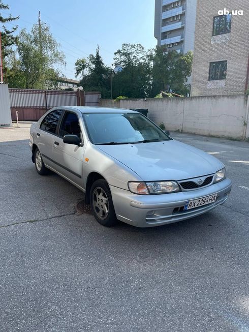 Nissan Almera 1998 серебристый - фото 8