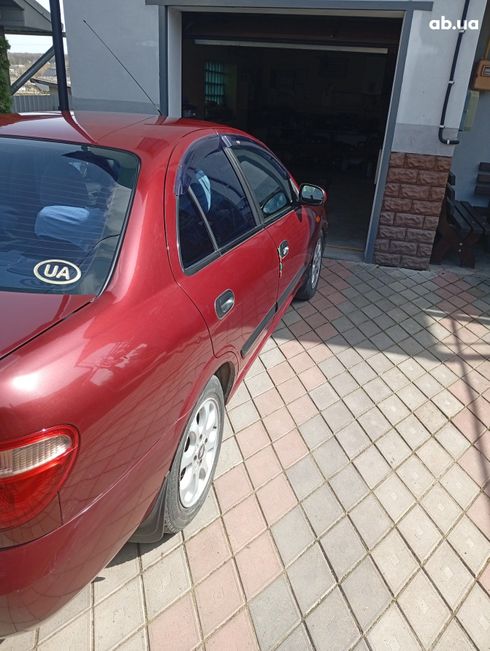 Nissan Almera 2004 вишневый - фото 11