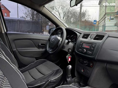 Renault Logan 2015 белый - фото 25