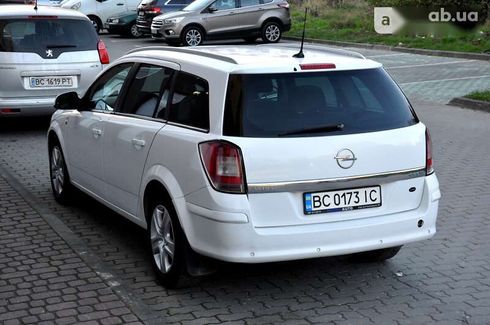 Opel Astra 2010 - фото 17