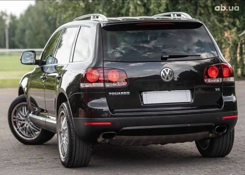 Volkswagen Touareg 2008 черный - фото 7