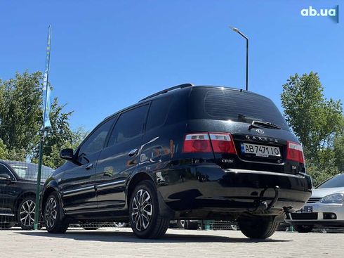 Kia Carens 2003 - фото 21