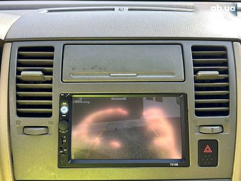 Nissan Tiida 2008 - фото 21