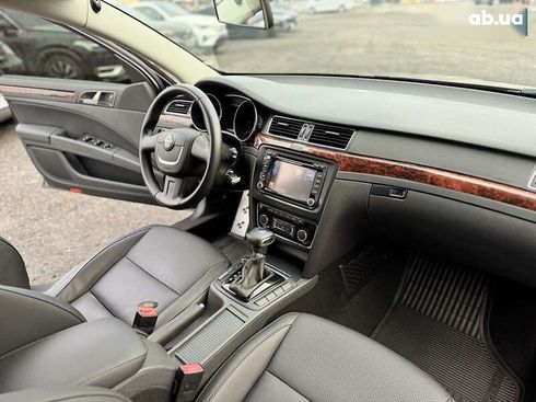 Skoda Superb 2012 - фото 19