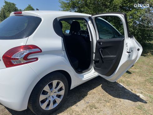 Peugeot 208 2014 белый - фото 12