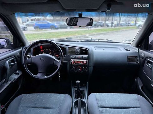 Nissan Primera 1996 - фото 9