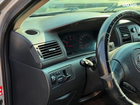 Toyota Corolla 2003 серый - фото 20