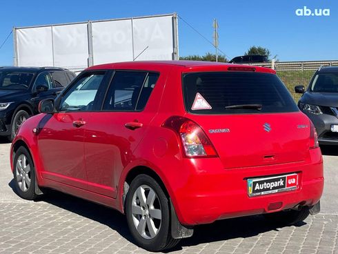 Suzuki Swift 2010 красный - фото 11
