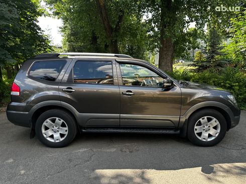 Kia Mohave 2010 коричневый - фото 3
