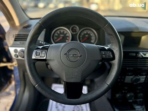 Opel Astra 2010 - фото 28