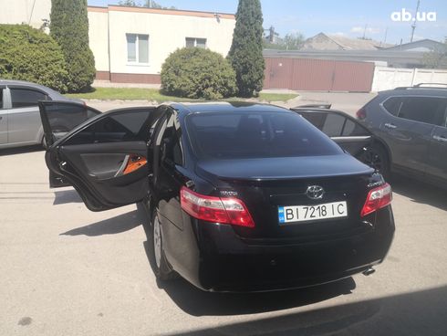 Toyota Camry 2010 черный - фото 4