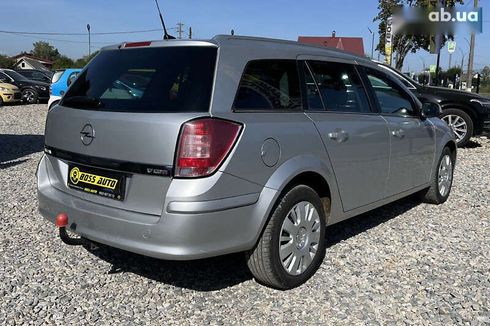 Opel Astra 2010 - фото 6