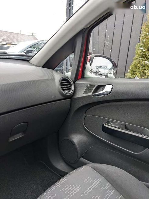 Opel Corsa 2012 - фото 17