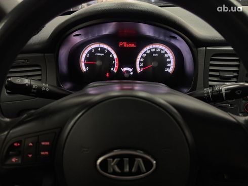 Kia Rio 2010 серебристый - фото 7
