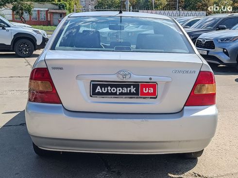 Toyota Corolla 2003 серый - фото 7