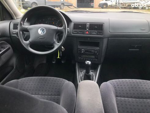 Volkswagen Golf 2004 черный - фото 12