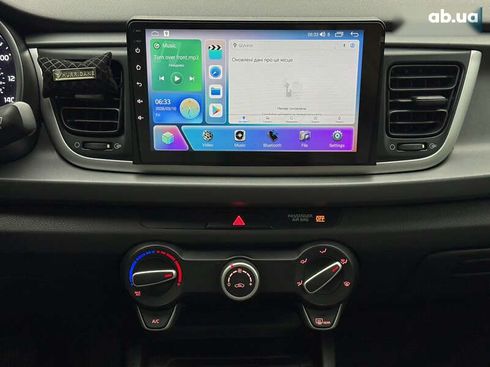 Kia Rio 2017 - фото 26