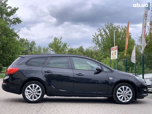 Opel Astra 2013 - фото 23