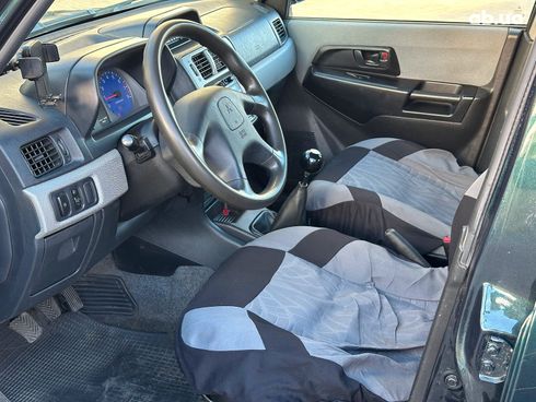 Mitsubishi Pajero Pinin 2003 зеленый - фото 39