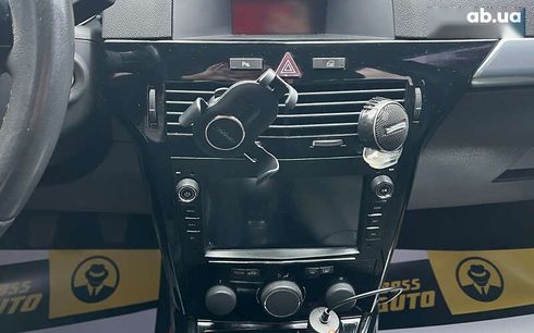 Opel Astra 2010 - фото 12