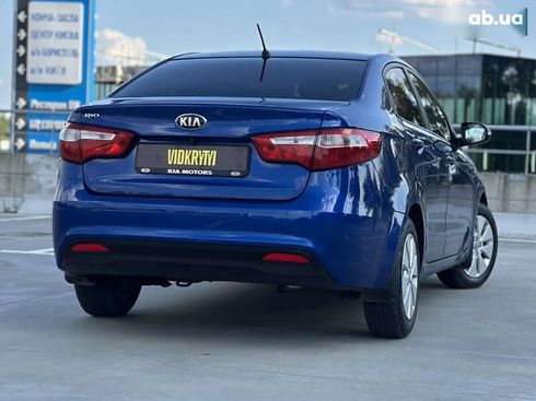 Kia Rio 2013 - фото 16