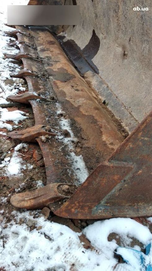 Komatsu WB 2010 - фото 9