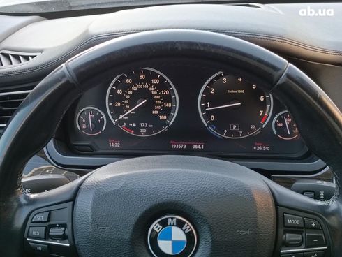BMW 7 серия 2012 белый - фото 25