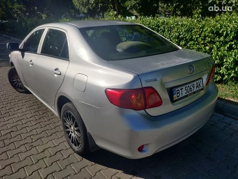 Toyota Corolla 2008 серебристый - фото 14