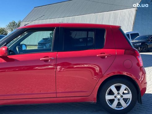 Suzuki Swift 2010 красный - фото 8