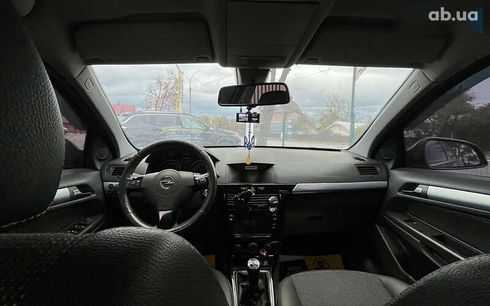 Opel Astra 2010 - фото 8