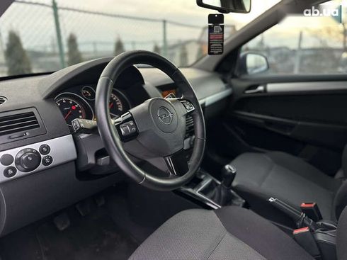 Opel Astra 2010 - фото 21