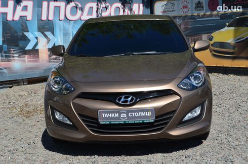 Hyundai i30 2012 коричневый - фото 2