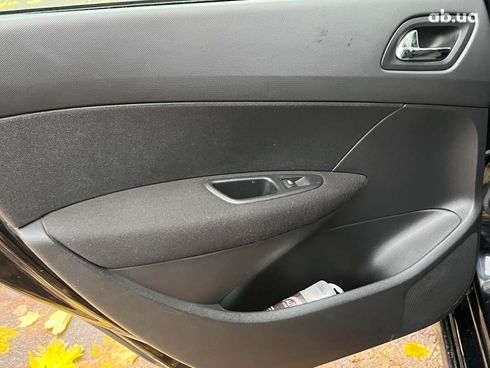 Peugeot 308 2011 черный - фото 20