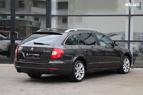 Skoda Superb 2011 - фото 4