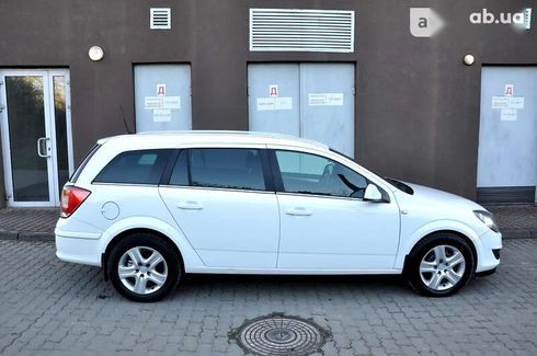 Opel Astra 2010 - фото 11