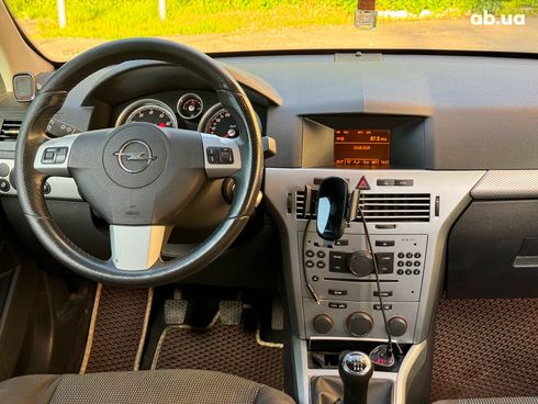 Opel Astra 2009 черный - фото 26