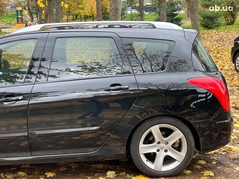 Peugeot 308 2011 черный - фото 8