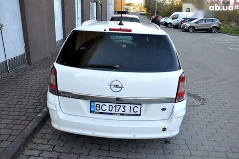 Opel Astra 2010 - фото 7