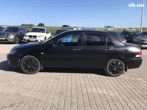 Mitsubishi Lancer 2008 черный - фото 15