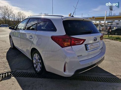 Toyota Auris 2014 - фото 6