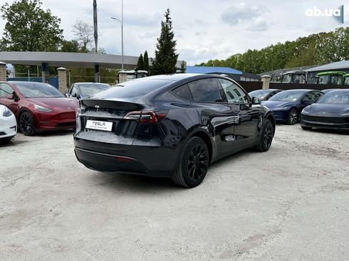 Tesla Model Y 2024 - фото 16