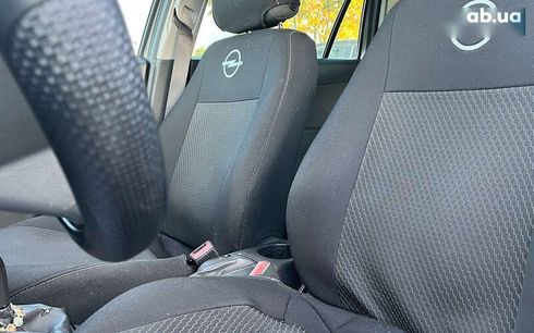 Opel Astra 2010 - фото 24