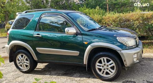 Toyota RAV4 2000 зеленый - фото 6