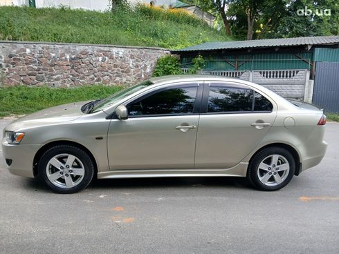 Mitsubishi Lancer 2008 золотистый - фото 4