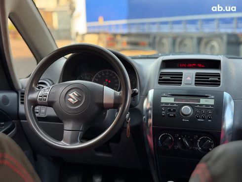 Suzuki SX4 2008 красный - фото 31