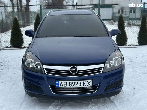 Opel Astra 2010 - фото 5