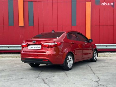 Kia Rio 2012 - фото 8