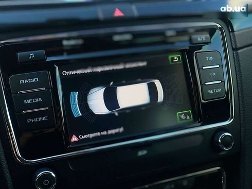 Skoda Superb 2012 - фото 29