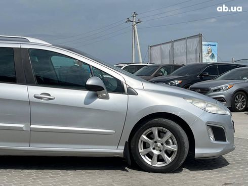 Peugeot 308 2011 серый - фото 37