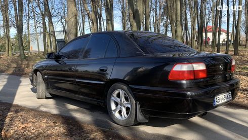 Opel Omega 2001 черный - фото 9